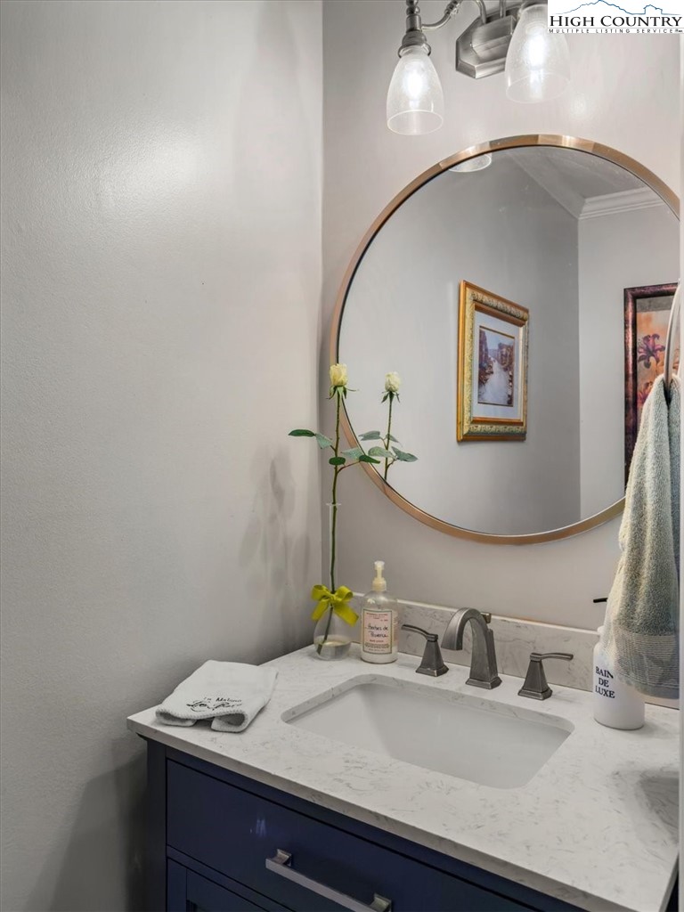 438 Glade Valley Road Glade Valley, NC 28627 - Photo 20 of 50 a bathroom with a sink and a mirror