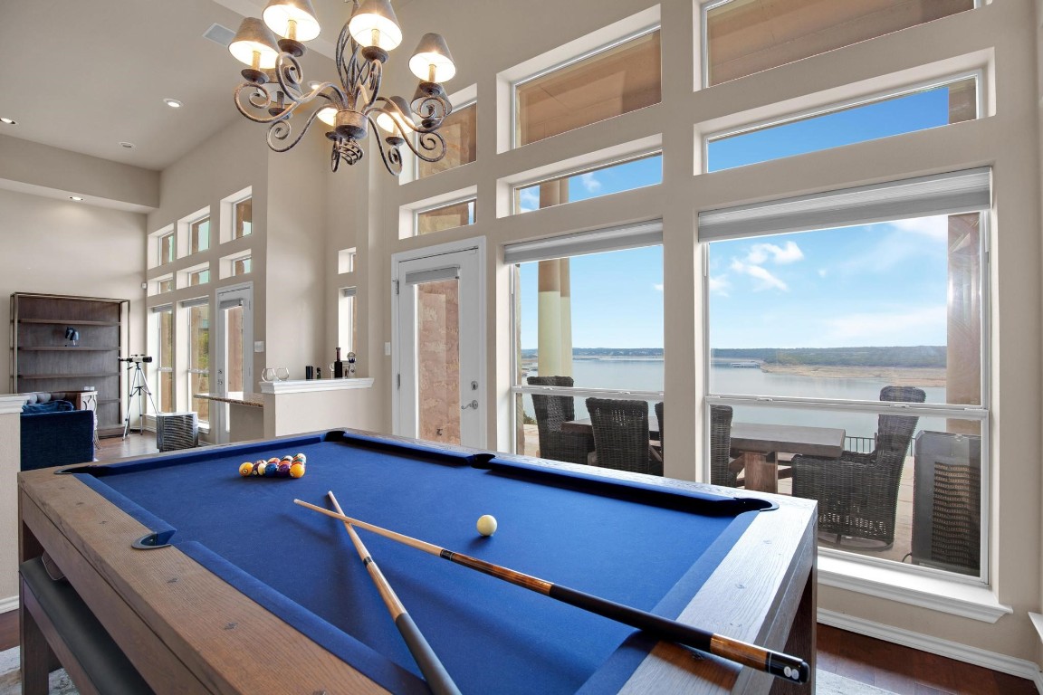 a room with gym equipment and a large window