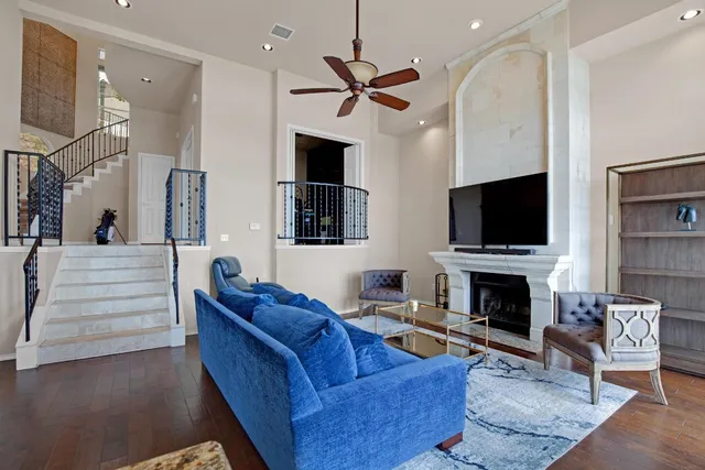 a kitchen with stainless steel appliances granite countertop a stove microwave and sink
