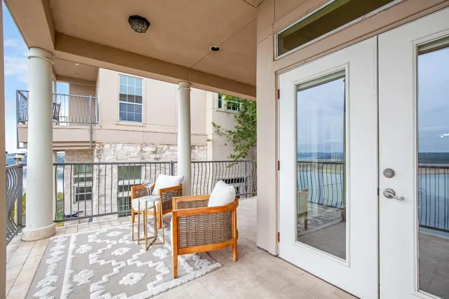 a bedroom with a bed and a book shelf