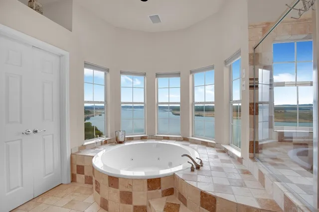 a living room with furniture fireplace and flat screen tv