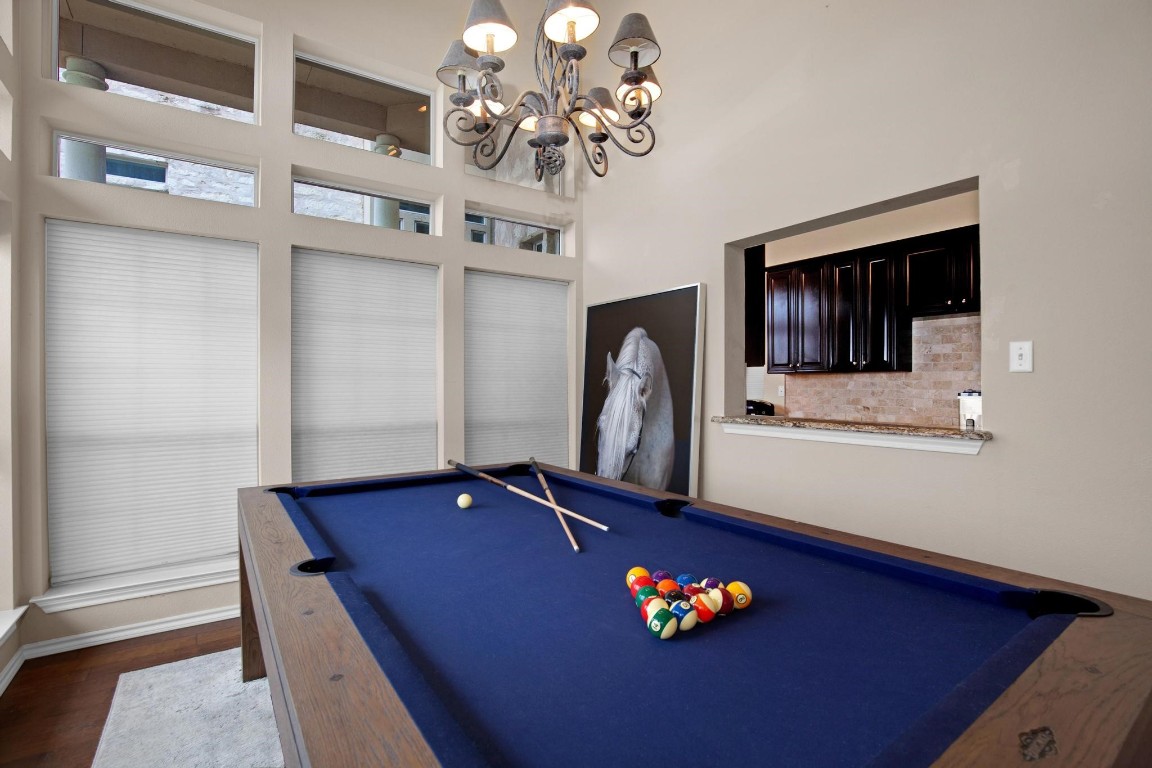 2918 Ranch Road 620 North, Unit L177 Austin, TX 78734 - Photo 9 of 40 a living room with furniture pool table and flat screen tv