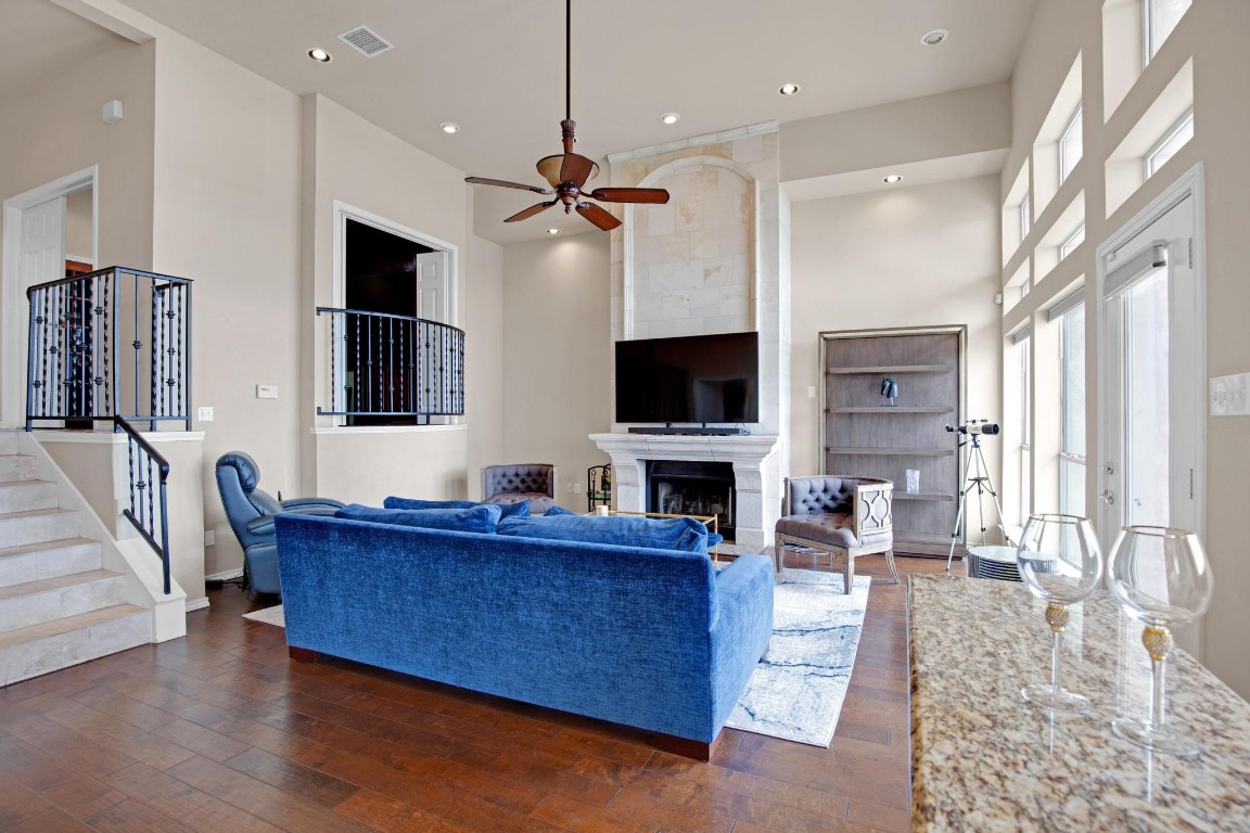 2918 Ranch Road 620 North, Unit L177 Austin, TX 78734 - Photo 10 of 40 a living room with furniture and a flat screen tv