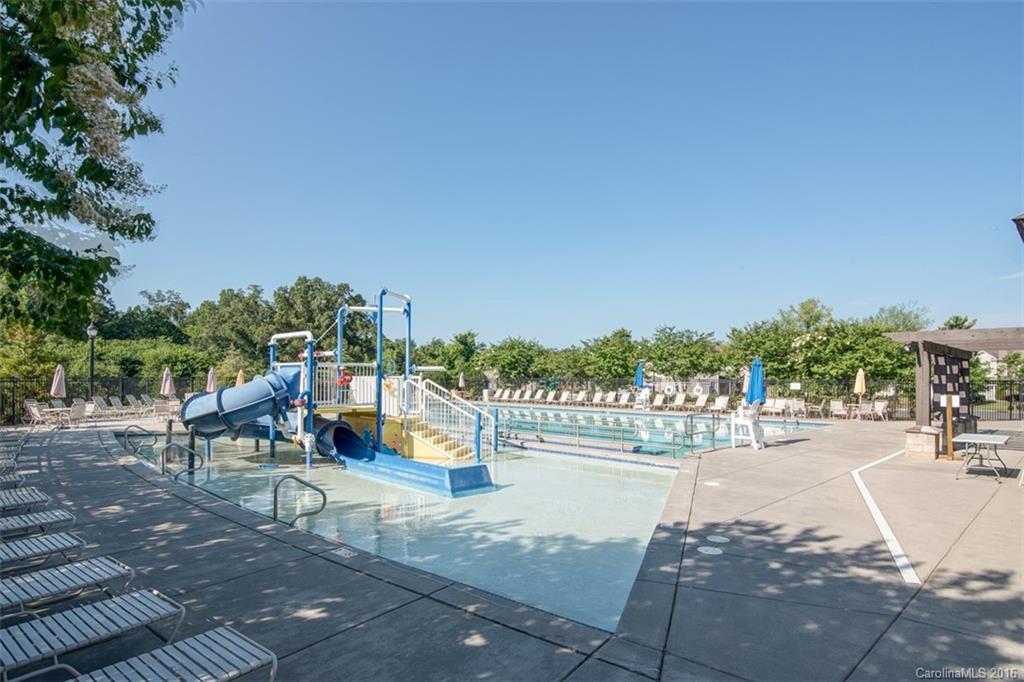 6106 Cactus Valley Road Charlotte, NC 28277 - Photo 22 of 24 a view of a park with swings and slides