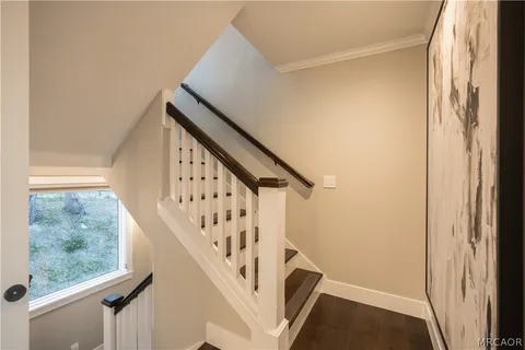 a view of entryway with wooden floor