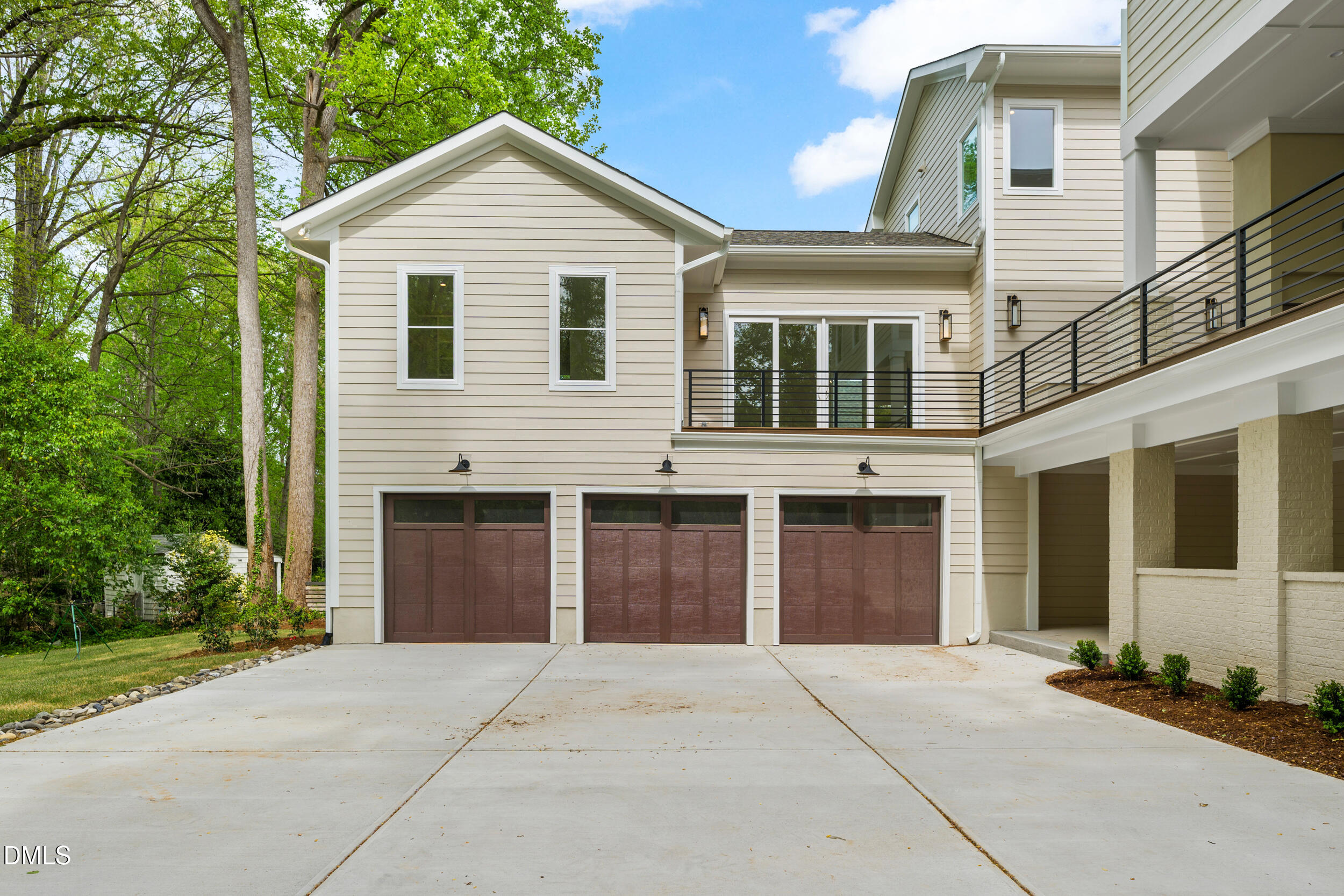 2817 Claremont Road Raleigh, NC 27608 - Photo 67 of 73 a front view of a house with a yard and garage