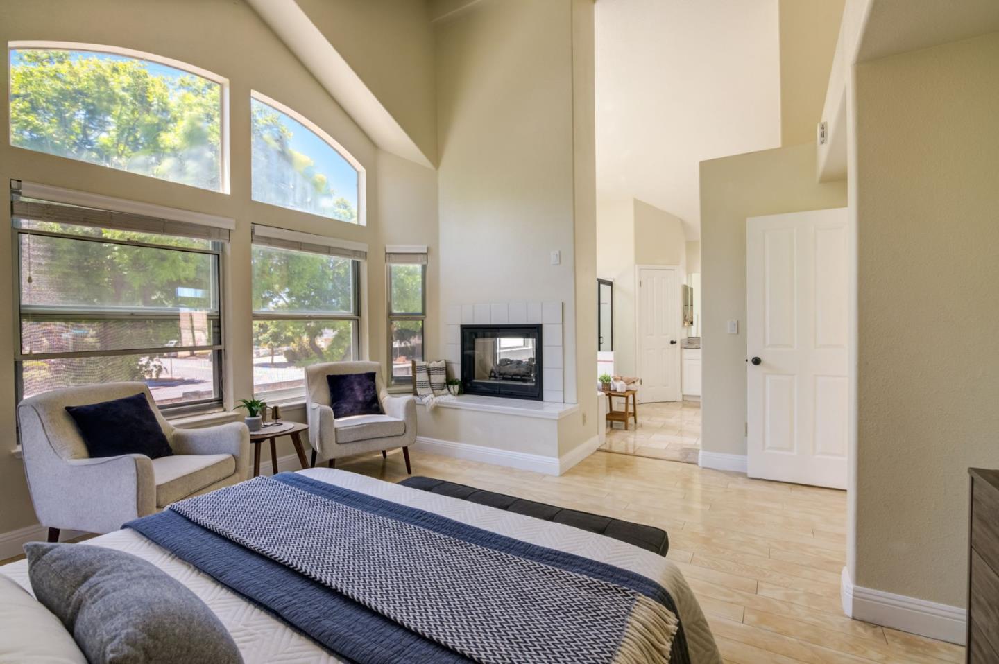 2699 Ramsdell Place San Jose, CA 95148 - Photo 20 of 40 a bedroom with a bed a flat screen tv and next to a window
