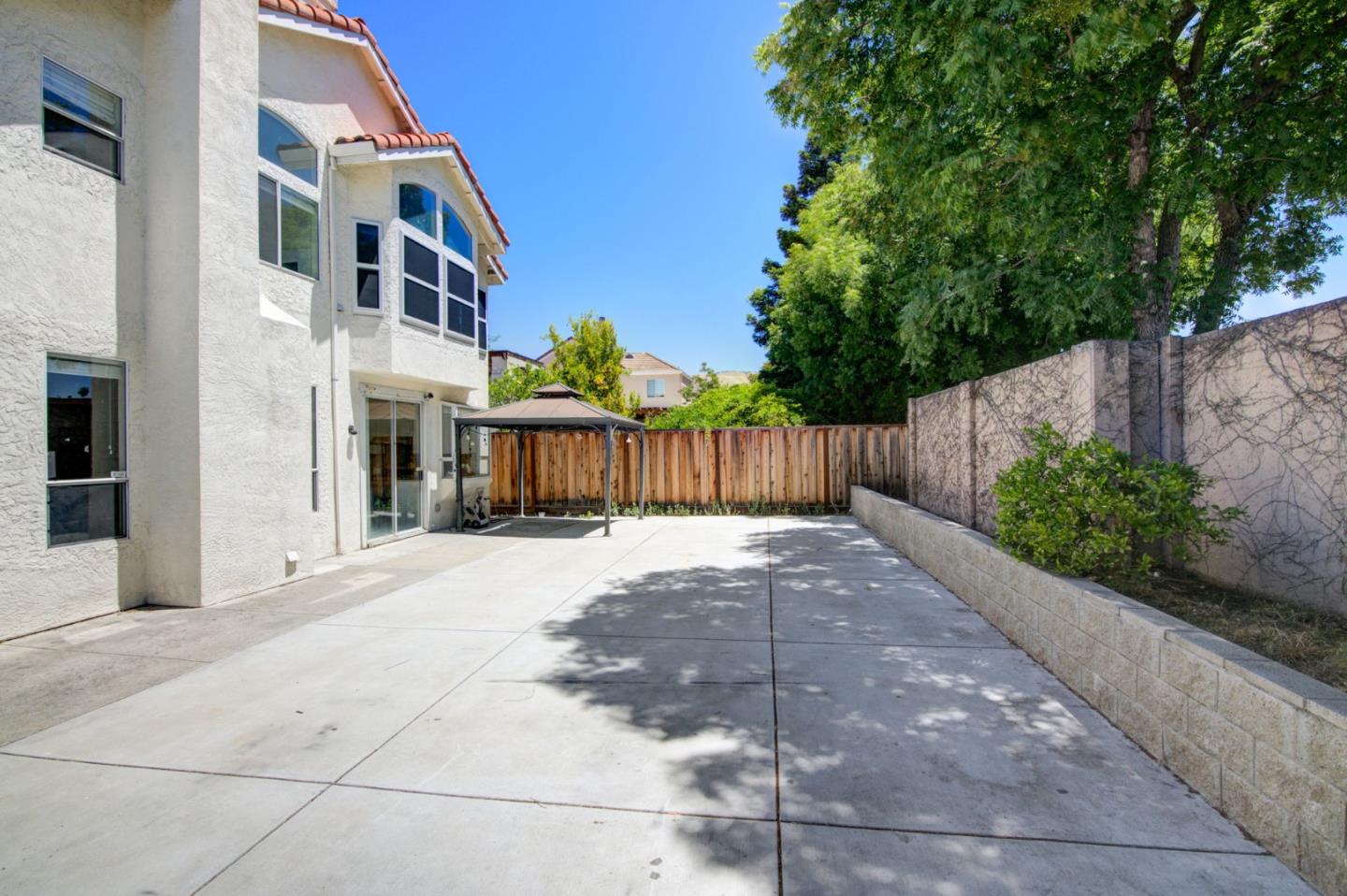 2699 Ramsdell Place San Jose, CA 95148 - Photo 29 of 40 a view of a street with brick walls