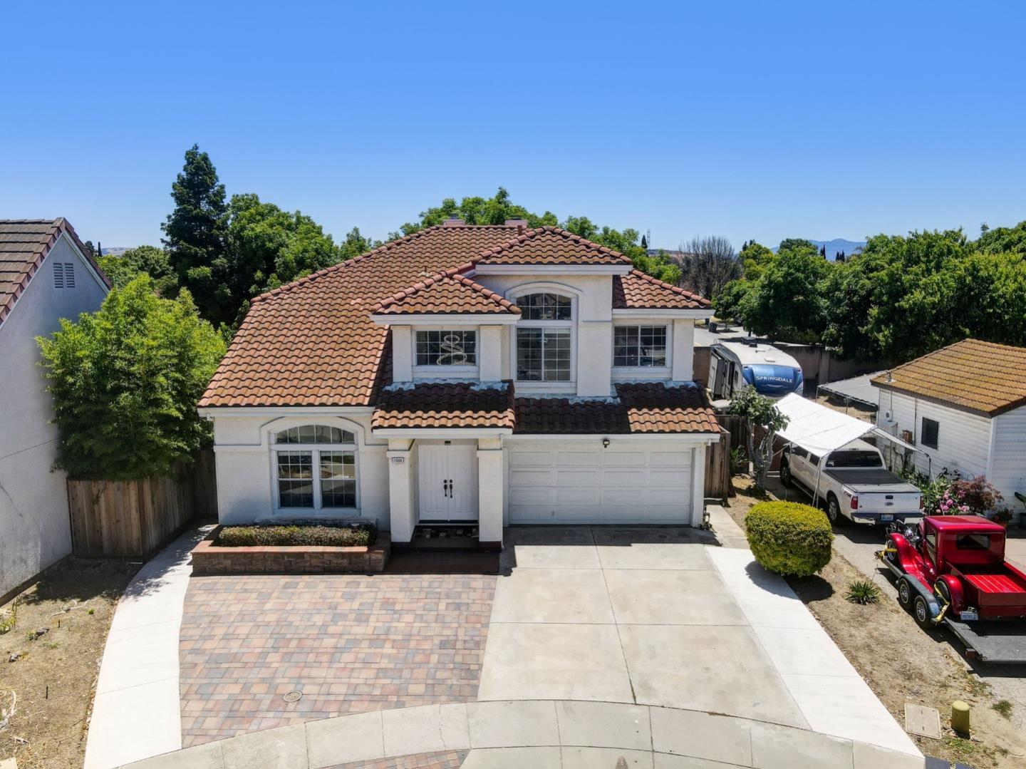 2699 Ramsdell Place San Jose, CA 95148 - Photo 32 of 40 a front view of a house with a yard