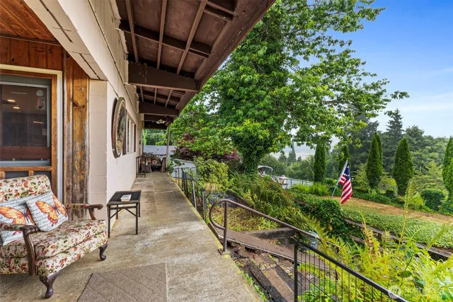 a view of a porch with furniture
