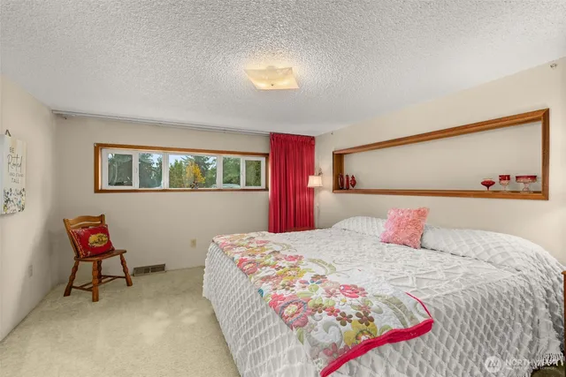 a house with trees in the background