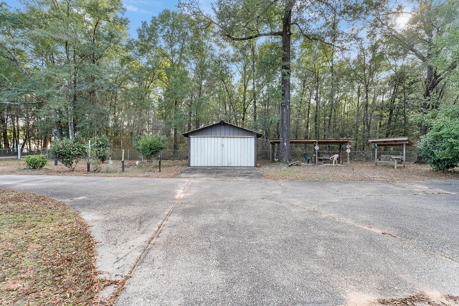 4780 Griffith Road Holt, FL 32564 - Photo 19 of 44 a view of a outdoor space with a house and a park
