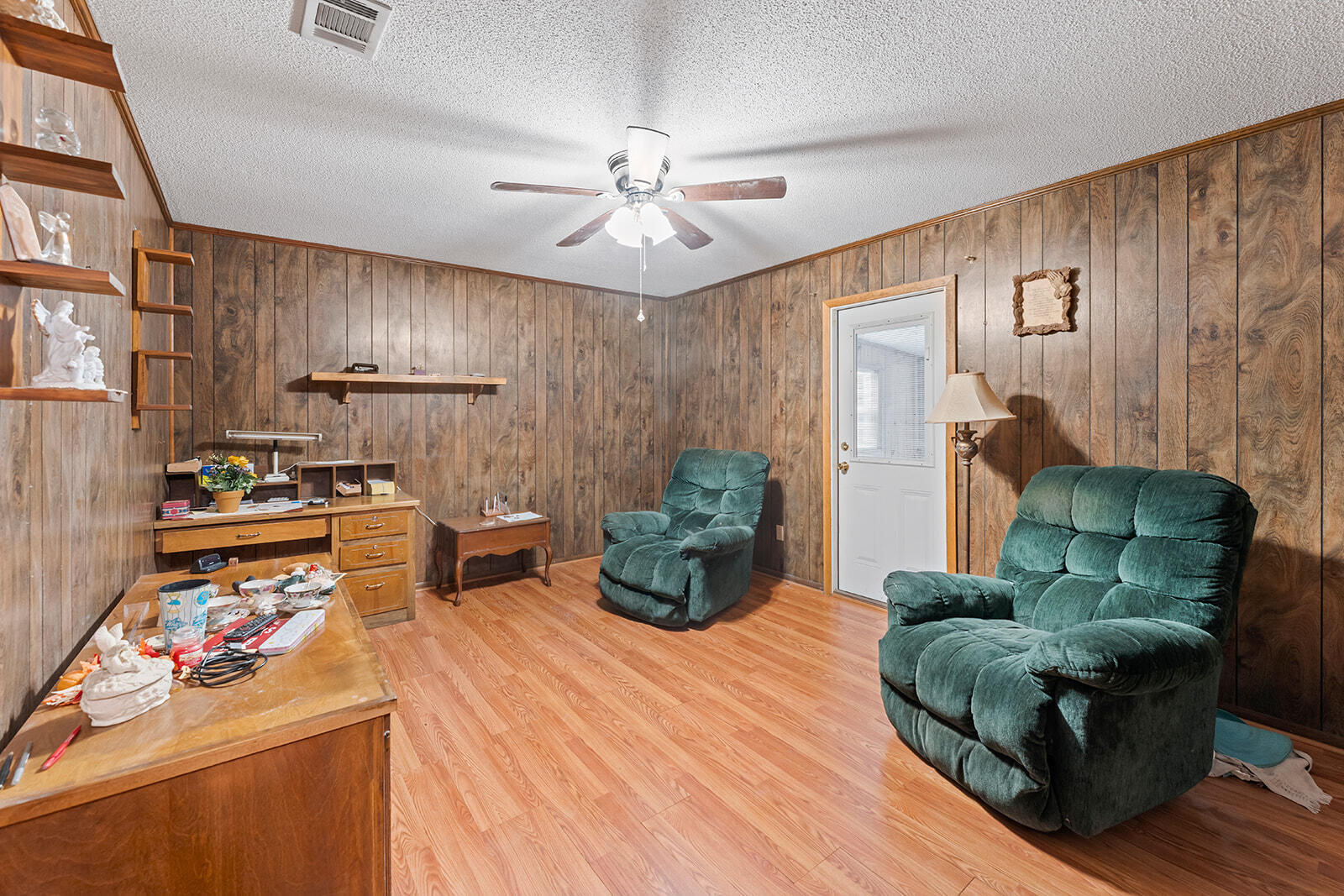 4780 Griffith Road Holt, FL 32564 - Photo 27 of 44 a living room with furniture and kitchen view