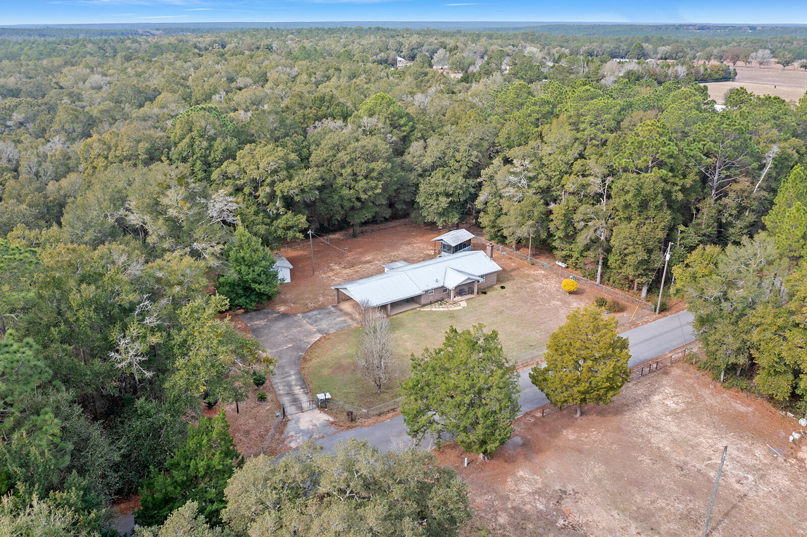 4780 Griffith Road Holt, FL 32564 - Photo 5 of 44 an aerial view of a house with a yard
