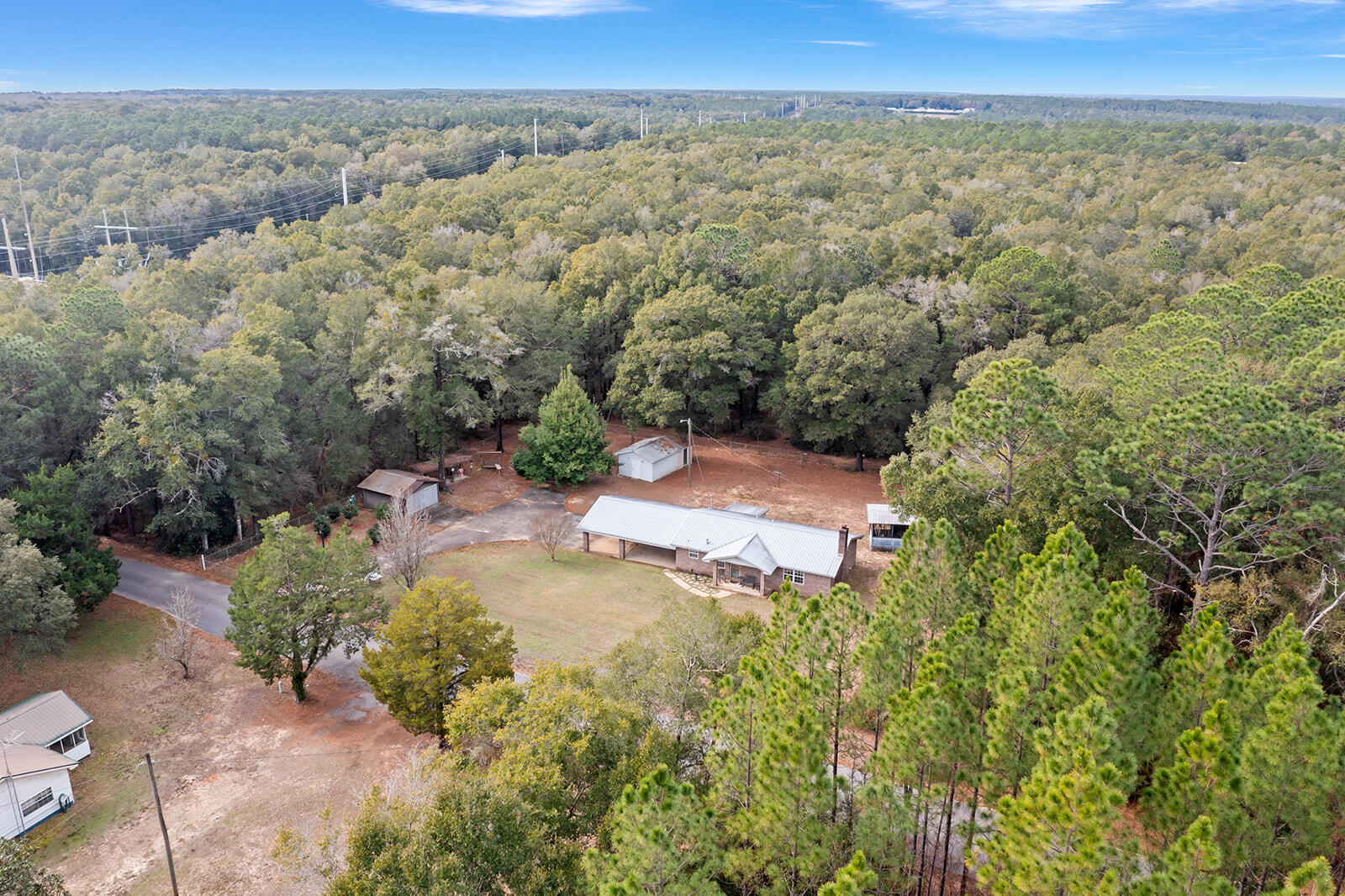 4780 Griffith Road Holt, FL 32564 - Photo 6 of 44 an aerial view of a house with a yard