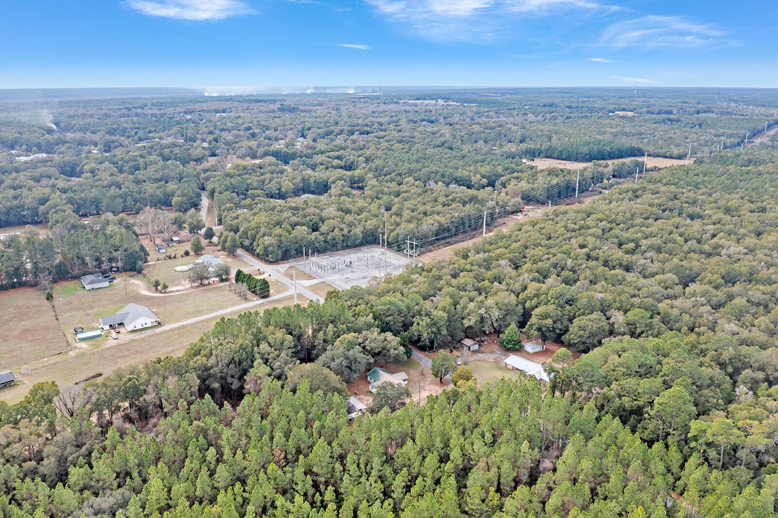 4780 Griffith Road Holt, FL 32564 - Photo 8 of 44 an aerial view of multiple house
