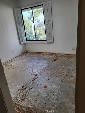 a view of a room with rack on the wall