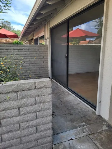 a view of backyard with cabin