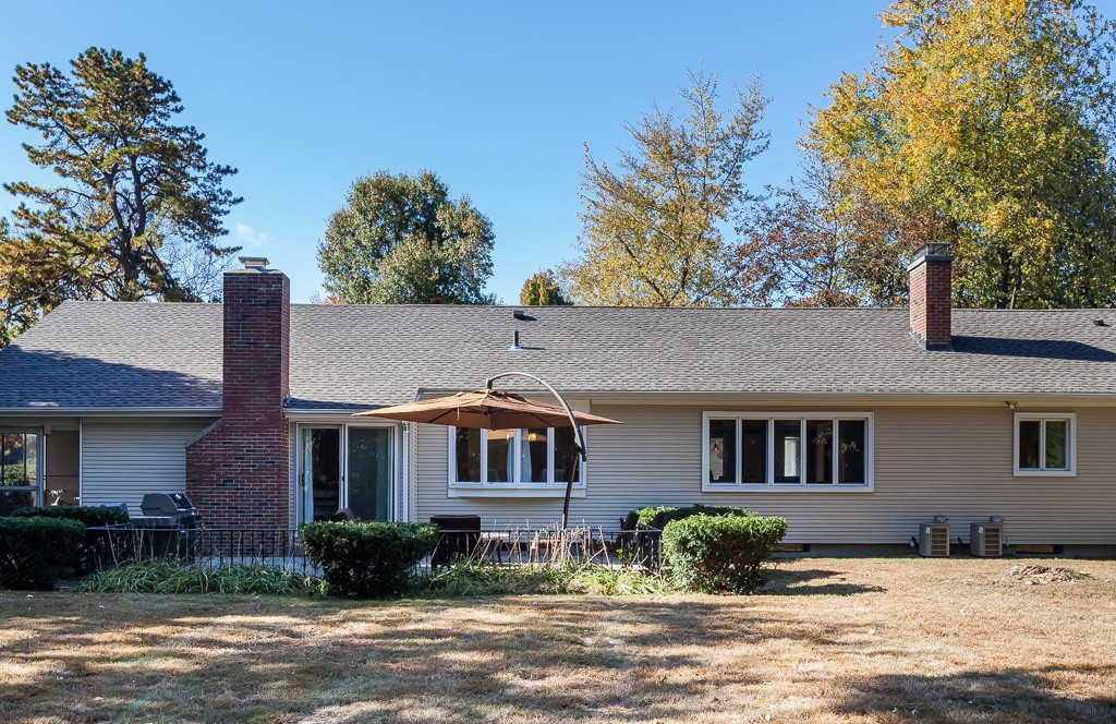 257 Captain Road Longmeadow, MA 01106 - Photo 4 of 30 a front view of a house with a yard