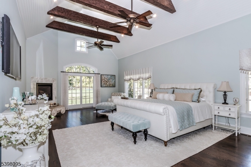 1 Juniper Pointe Trail Dunellen, NJ 08812 - Photo 14 of 44 a spacious bedroom with a bed a couch and large windows