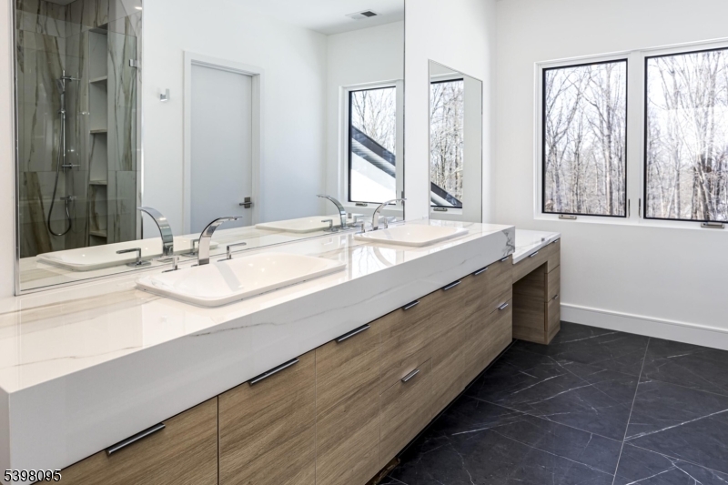 1 Juniper Pointe Trail Dunellen, NJ 08812 - Photo 20 of 44 a bathroom with a double vanity sink and a large mirror