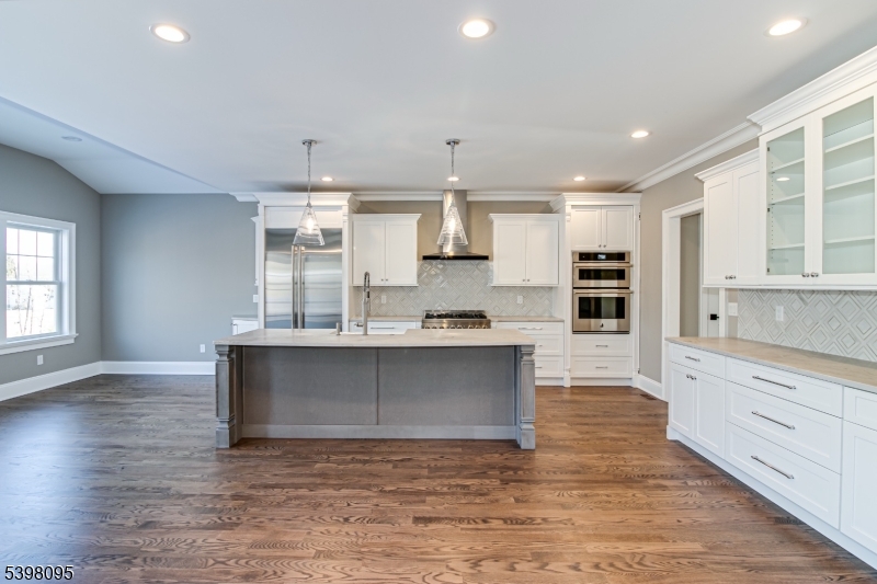 1 Juniper Pointe Trail Dunellen, NJ 08812 - Photo 33 of 44 a large kitchen with kitchen island a sink stainless steel appliances and cabinets