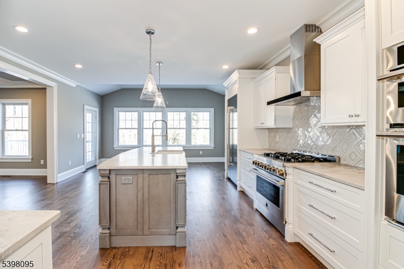 1 Juniper Pointe Trail Dunellen, NJ 08812 - Photo 39 of 44 a kitchen with stainless steel appliances granite countertop a stove and a wooden floors