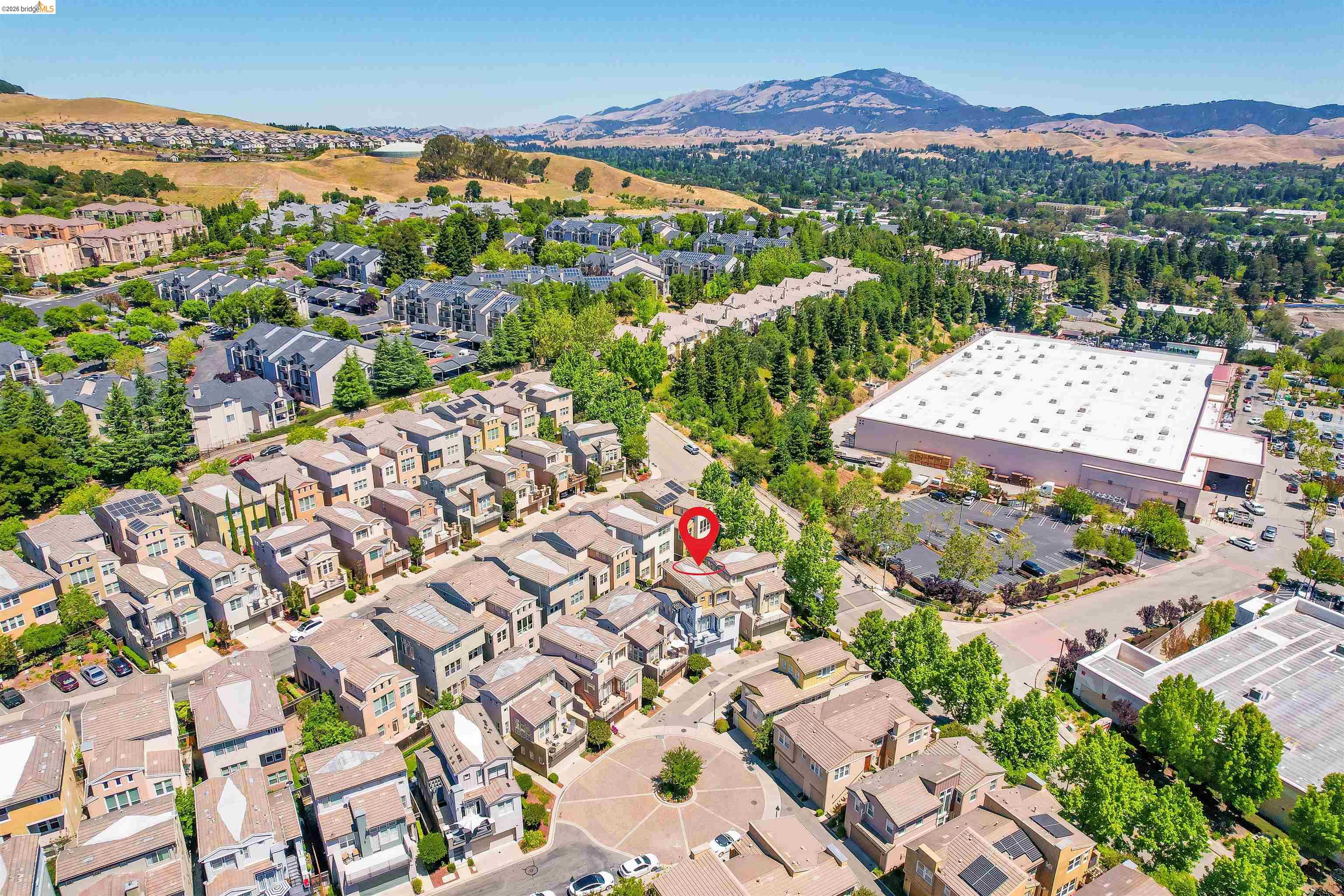449 Constantine Court San Ramon, CA 94583 - Photo 61 of 63 Aerial perspective of a multi-story residence within a modern residential community, featuring consistent architectural styling