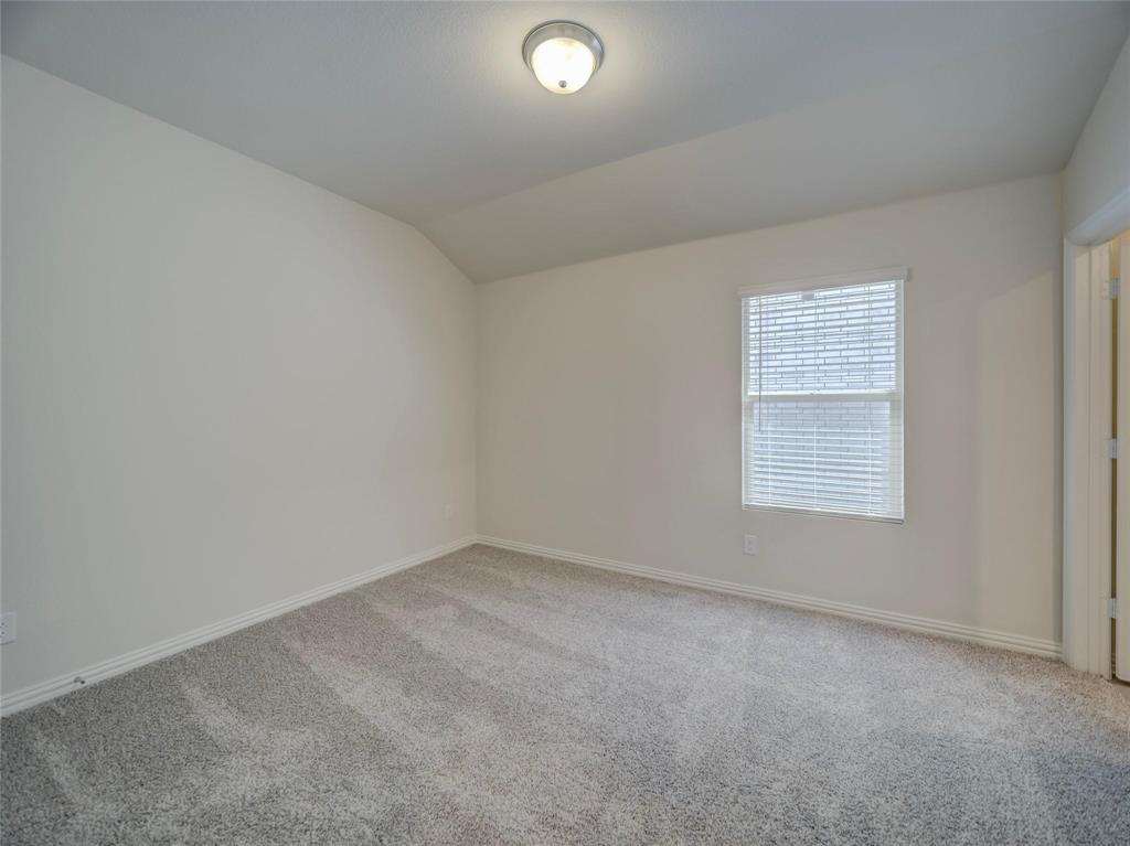 3405 Kingsgarden Road Denton, TX 76207 - Photo 21 of 37 an empty room with a window