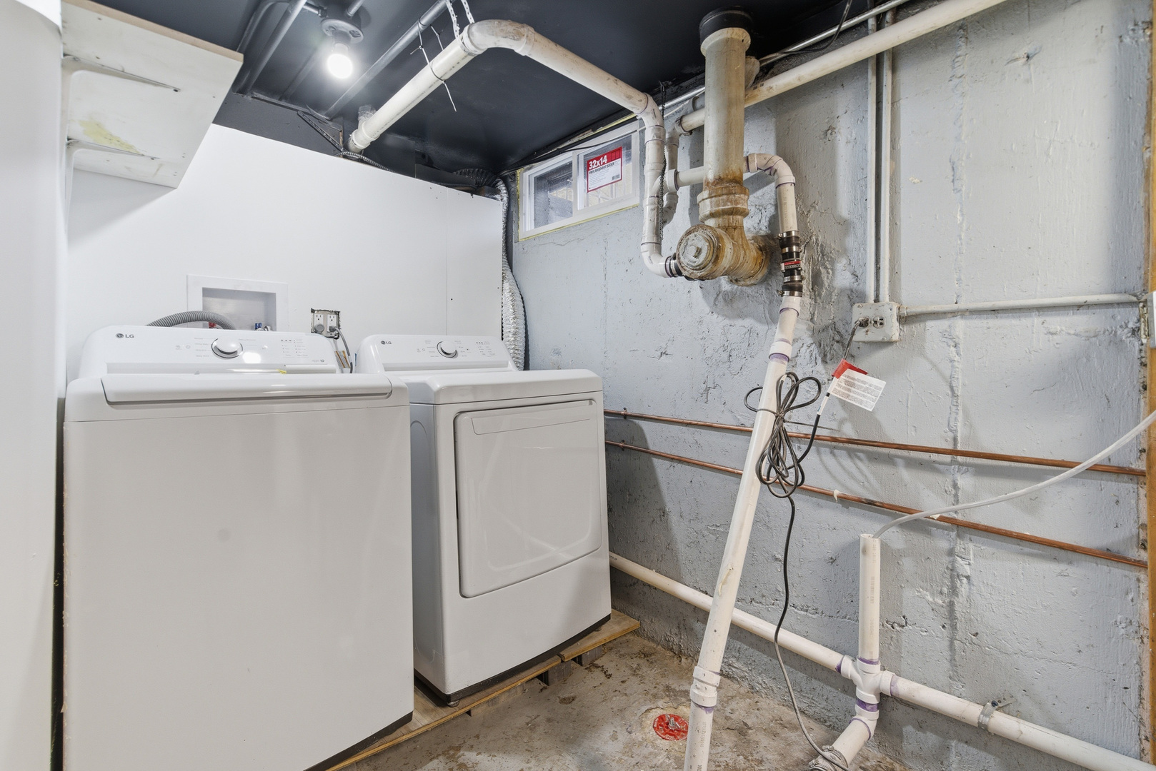 7545 Beloit Avenue Bridgeview, IL 60455 - Photo 26 of 31 a utility room with dryer and washer