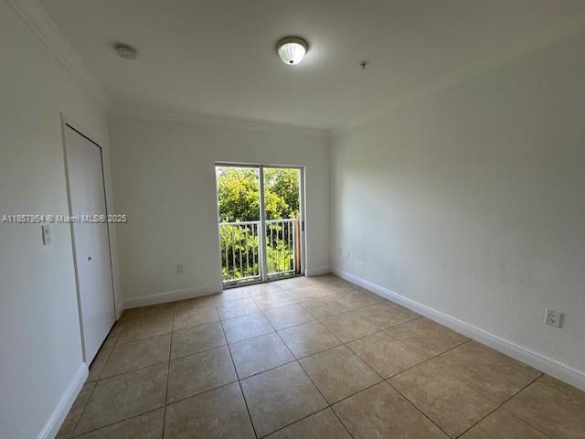 20810 Southwest 87th Avenue, Unit 308 Cutler Bay, FL 33189 - Photo 19 of 24 a view of an empty room with a window