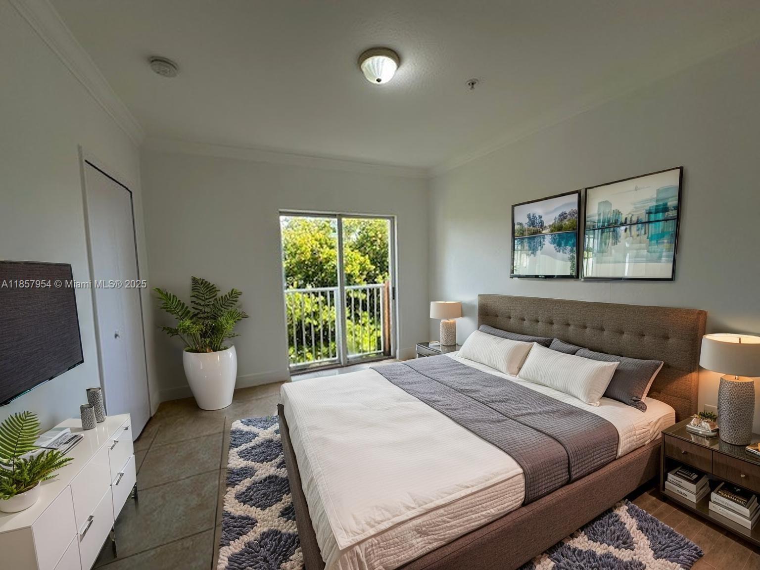 20810 Southwest 87th Avenue, Unit 308 Cutler Bay, FL 33189 - Photo 7 of 24 a bedroom with a large bed and a potted plant