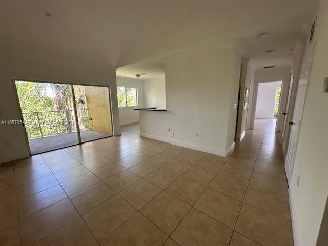 20810 Southwest 87th Avenue, Unit 308 Cutler Bay, FL 33189 - Photo 8 of 24 a view of hallway with stairs
