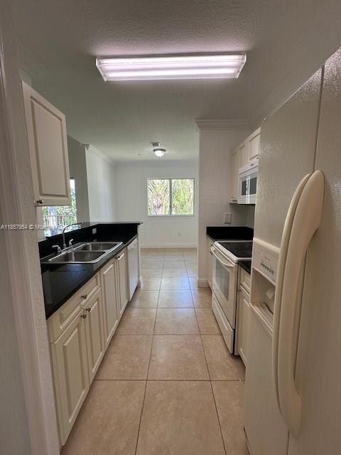 20810 Southwest 87th Avenue, Unit 308 Cutler Bay, FL 33189 - Photo 10 of 24 a kitchen with a sink stainless steel appliances and cabinets