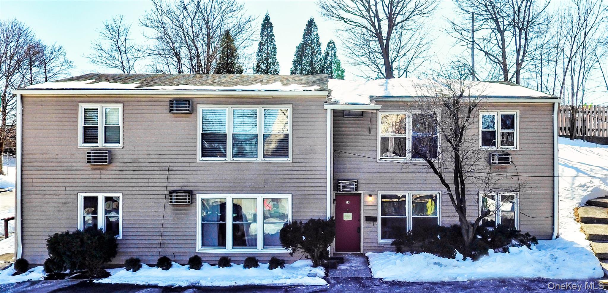 19 Gerald Drive, Unit B2 Poughkeepsie, NY 12601 - Photo 12 of 14 a front view of a house with garden
