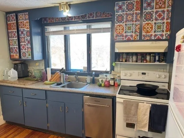 a kitchen with a cabinets and a stove