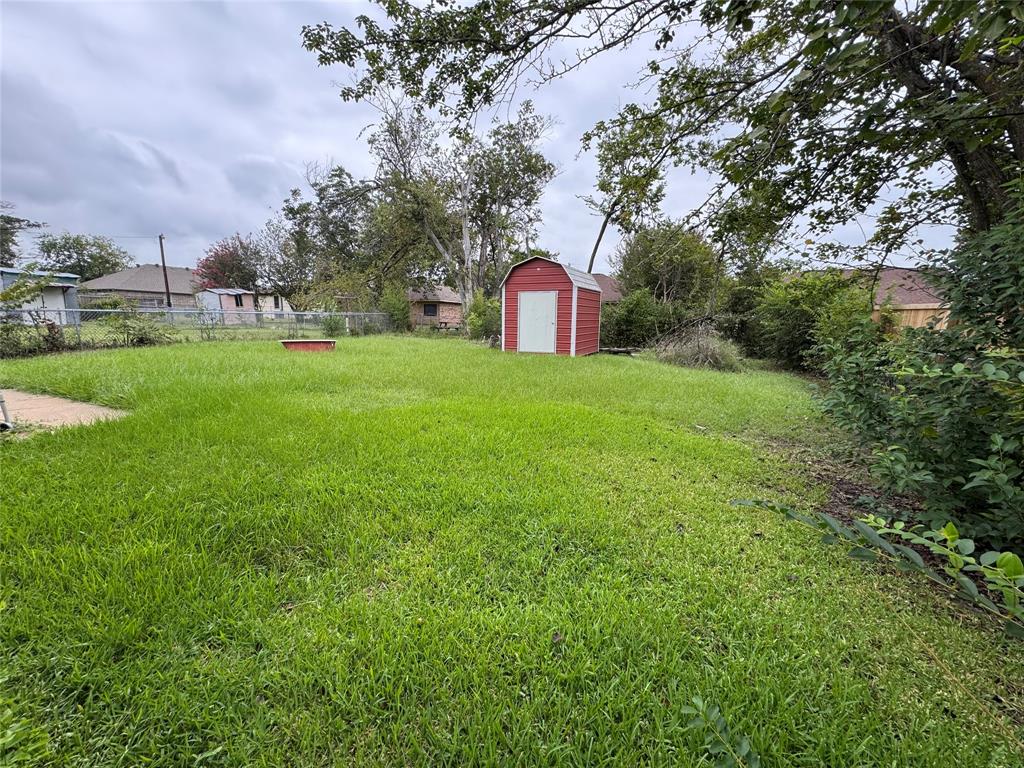 609 Bethlehem Street Terrell, TX 75160 - Photo 6 of 19 a view of a large yard with plants and large trees