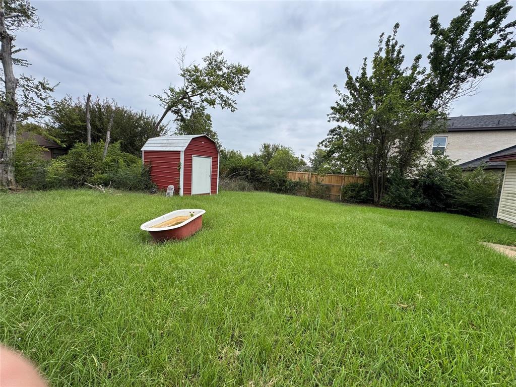 609 Bethlehem Street Terrell, TX 75160 - Photo 7 of 19 a view of a backyard with a garden