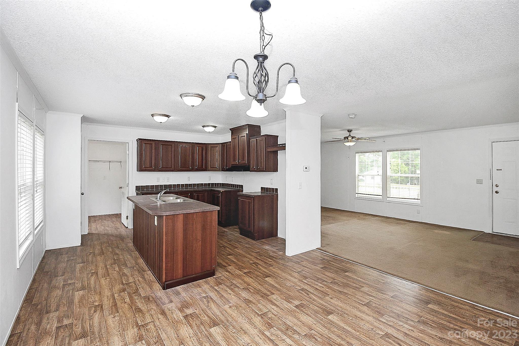 812 Margrace Road Kings Mountain, NC 28086 - Photo 22 of 34 a view of a kitchen with wooden floor