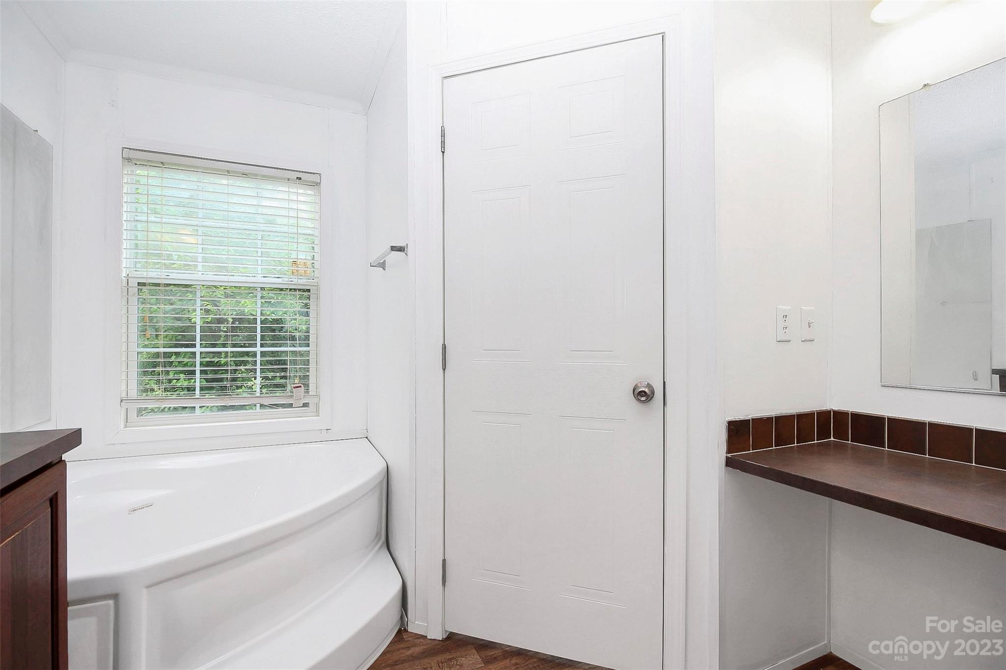 812 Margrace Road Kings Mountain, NC 28086 - Photo 27 of 34 a bathroom with a bathtub and shower