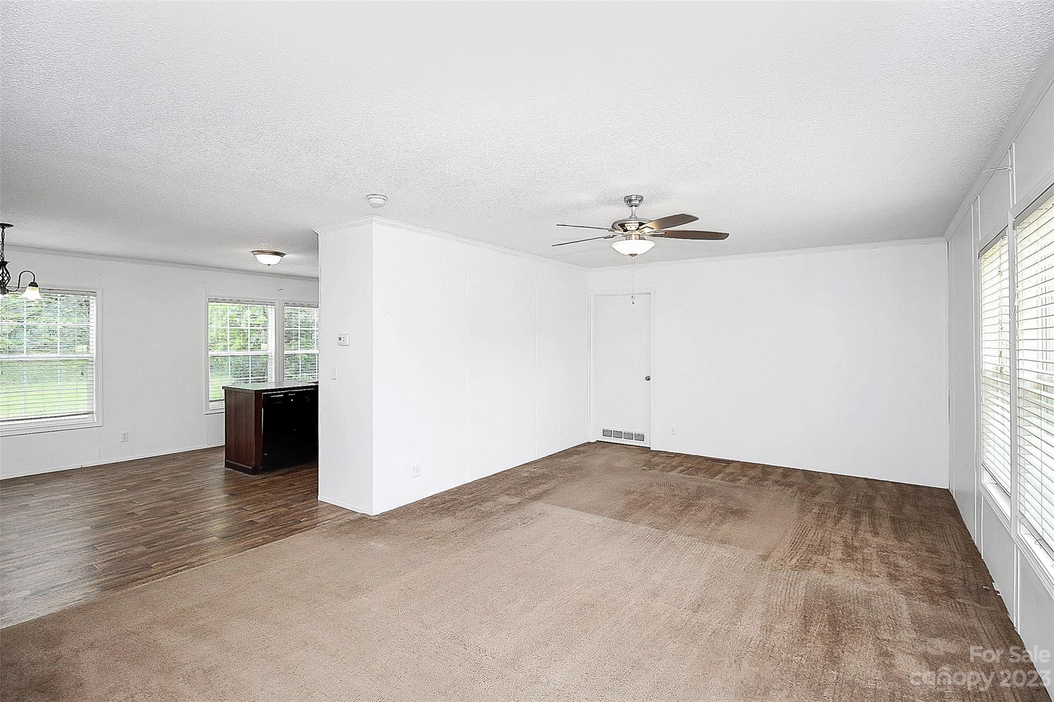 812 Margrace Road Kings Mountain, NC 28086 - Photo 30 of 34 wooden floor in an empty room with a window