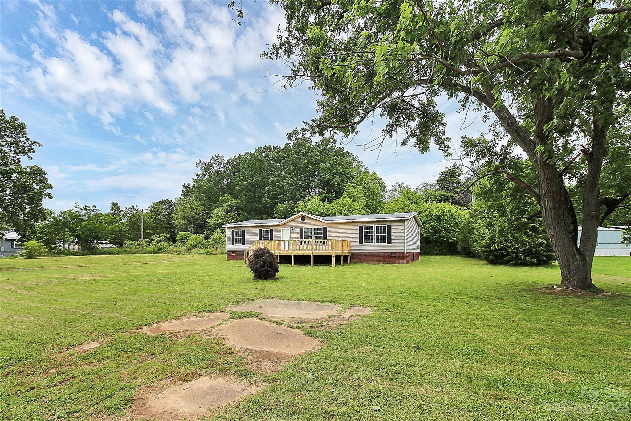 812 Margrace Road Kings Mountain, NC 28086 - Photo 3 of 34 a view of a house with a big yard