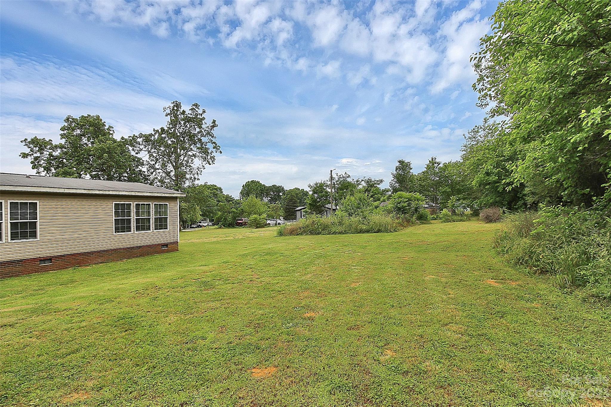 812 Margrace Road Kings Mountain, NC 28086 - Photo 7 of 34 a view of a house with a yard