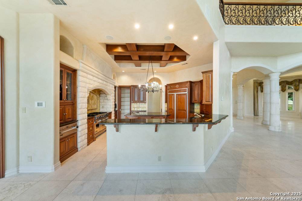 217 Bella Riva Drive Austin, TX 78734 - Photo 13 of 38 a view of living room with furniture and chandelier