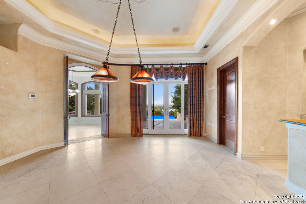 217 Bella Riva Drive Austin, TX 78734 - Photo 17 of 38 a view of an empty room with a window