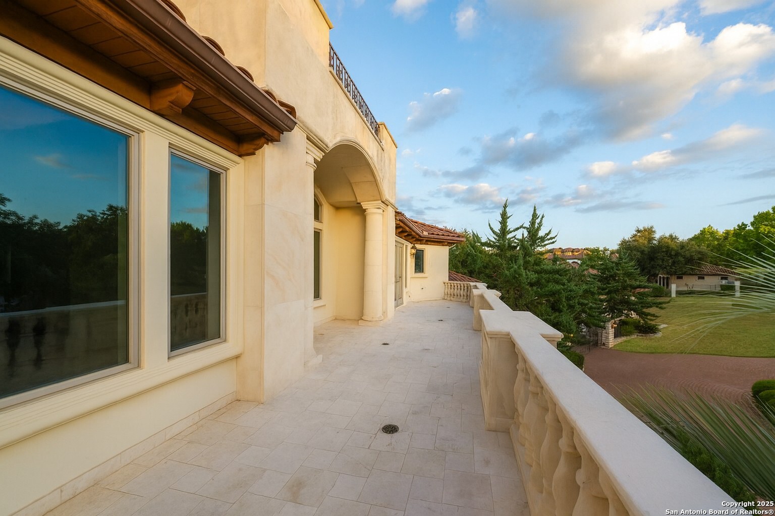 217 Bella Riva Drive Austin, TX 78734 - Photo 2 of 38 a view of balcony and hardwood