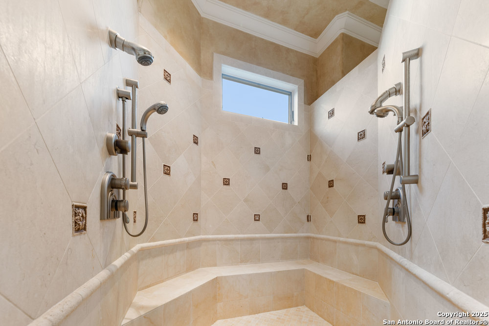 217 Bella Riva Drive Austin, TX 78734 - Photo 23 of 38 a bathroom with a bath tub