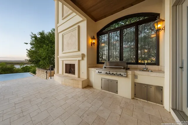 a view of a swimming pool with a yard