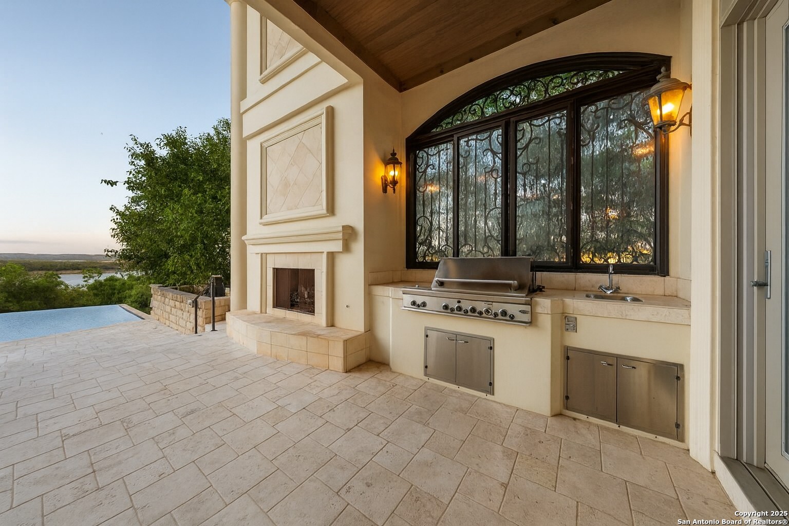217 Bella Riva Drive Austin, TX 78734 - Photo 28 of 38 a kitchen with a stove and white cabinets