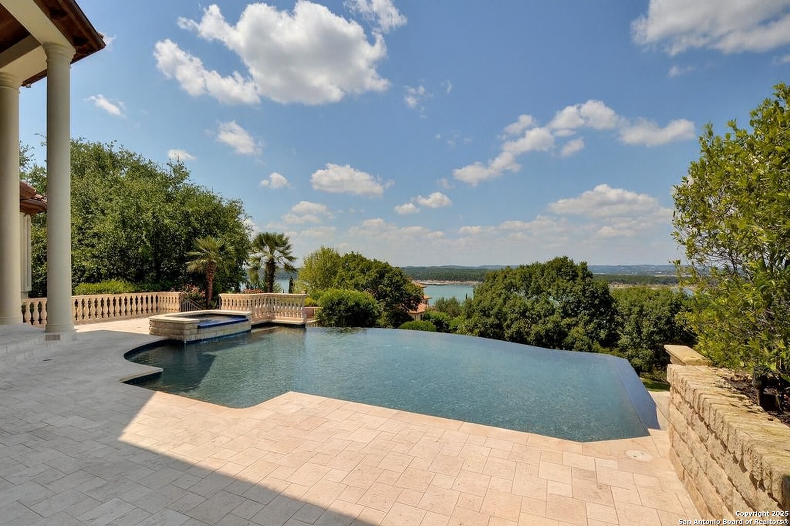 217 Bella Riva Drive Austin, TX 78734 - Photo 29 of 38 a view of a garden with swimming pool